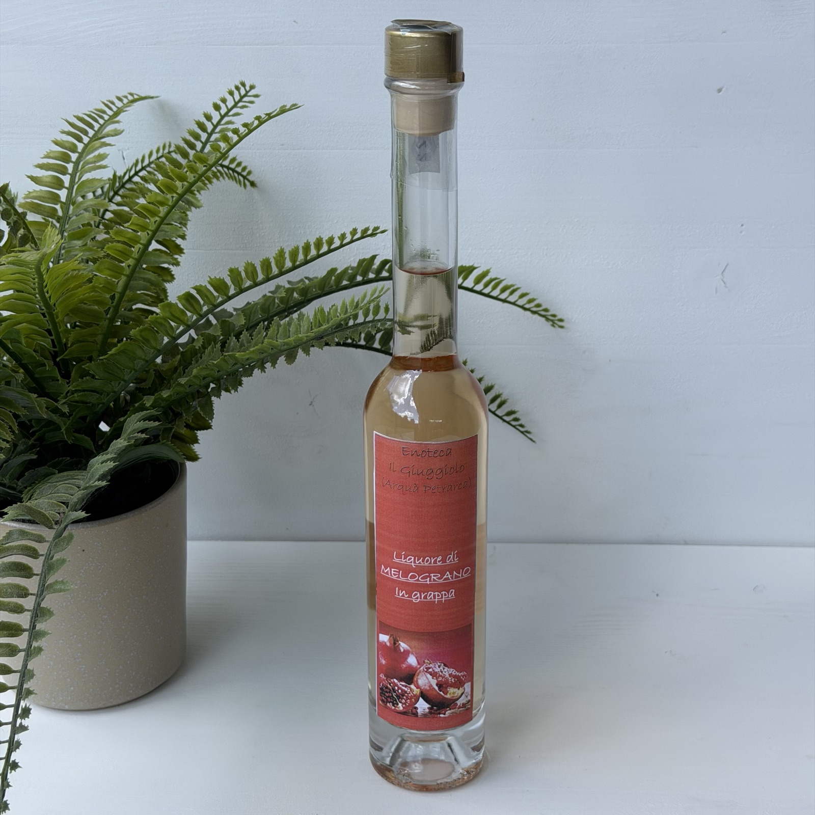 Liquore di melograno in grappa dell'Enoteca Il Giuggiolo